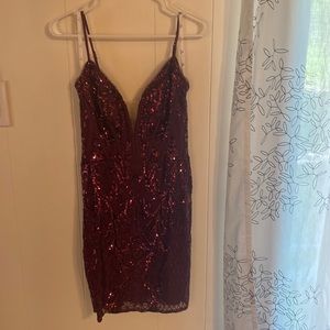 This is the perfect dress for homecoming! It’s only been worn once.